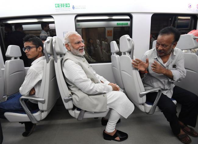 Congress attacks Narendra Modi over his Delhi Metro ride