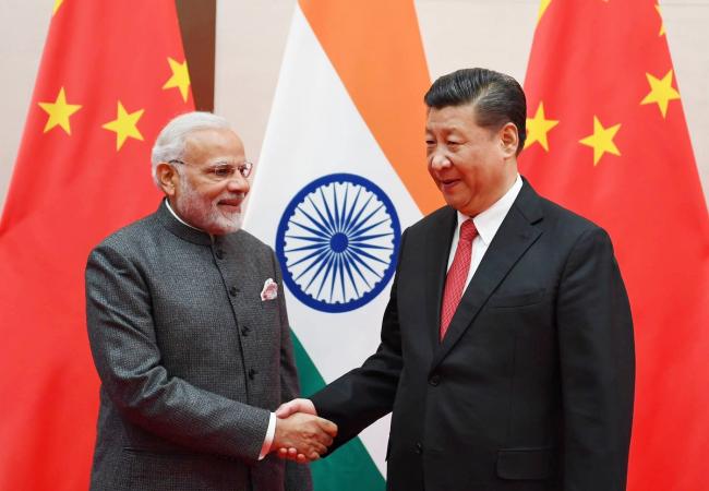 Narendra Modi meets Chinese President Xi Jinping, discusses bilateral, global issues