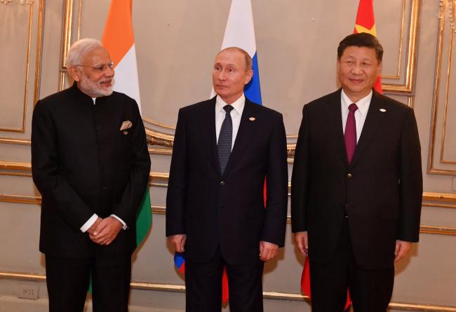 PM Modi, Putin, Xi meet for RIC meeting