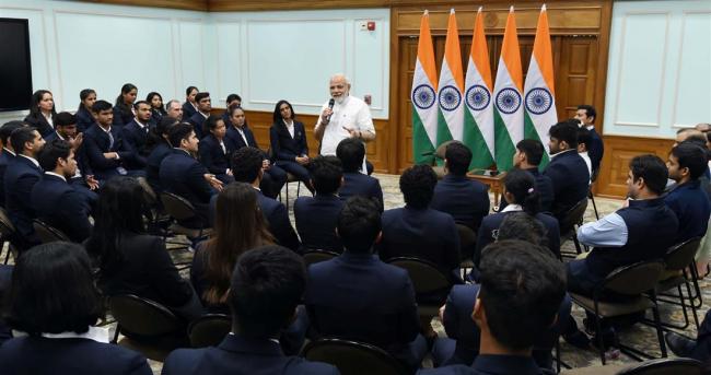 PM Narendra Modi interacts with medal winners and others from the recently concluded Commonwealth Games