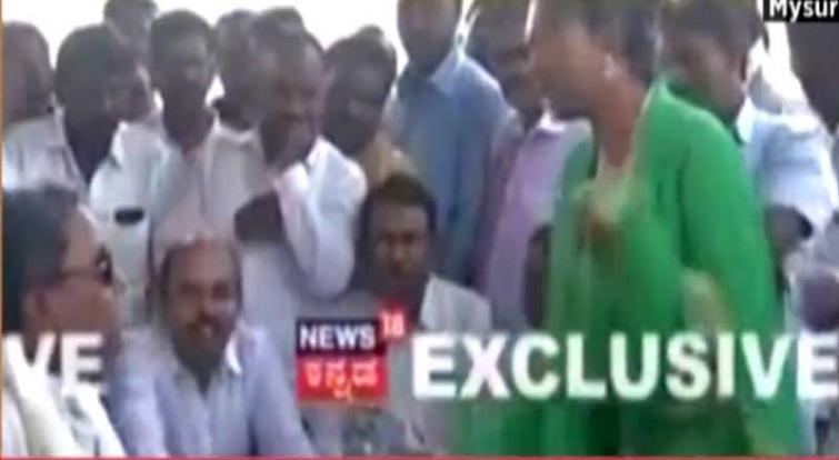 Former Karnataka CM Siddaramaiah caught on camera snatching mike from woman 