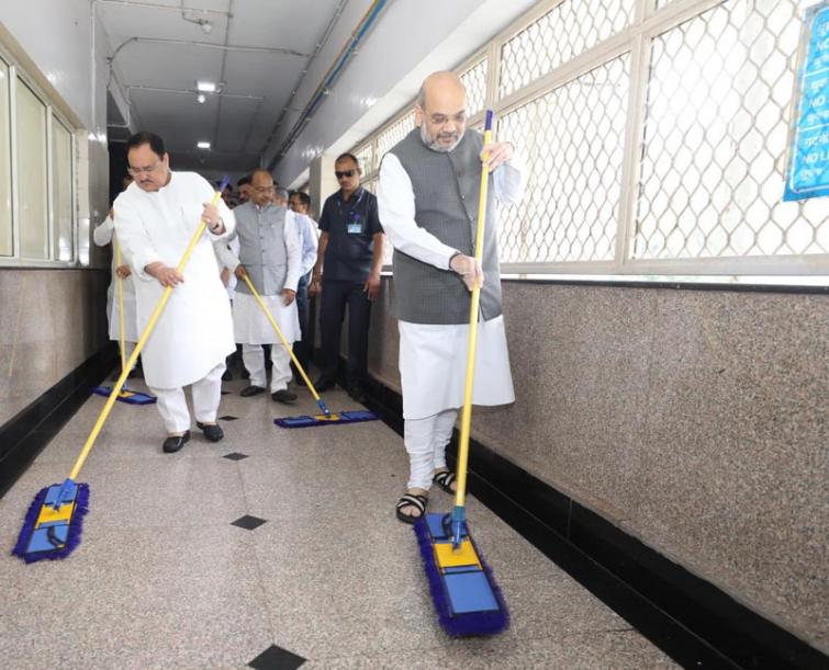 Seva Saptah: Amit Shah, JP Nadda sweep floor at AIIMS