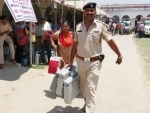 Four cops suspended after 6 EVMs found in hotel