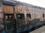 Two jump out of train on fire and die