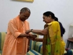 UP Governor Anandiben Patel ties rakhi to CM Yogi