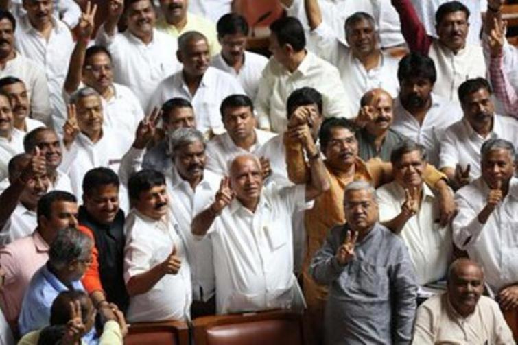 Karnataka bypolls: BJP takes early leads