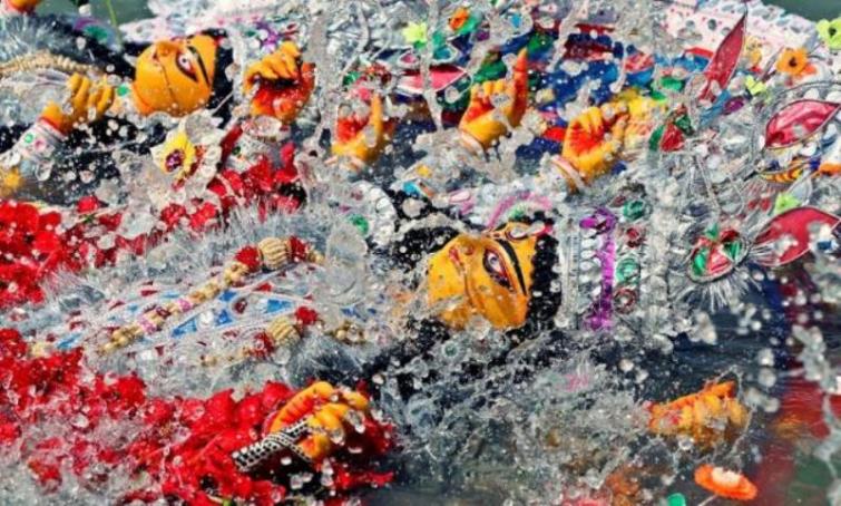Assam: Durga idols of India and Bangladesh immersed in Kushiyara river