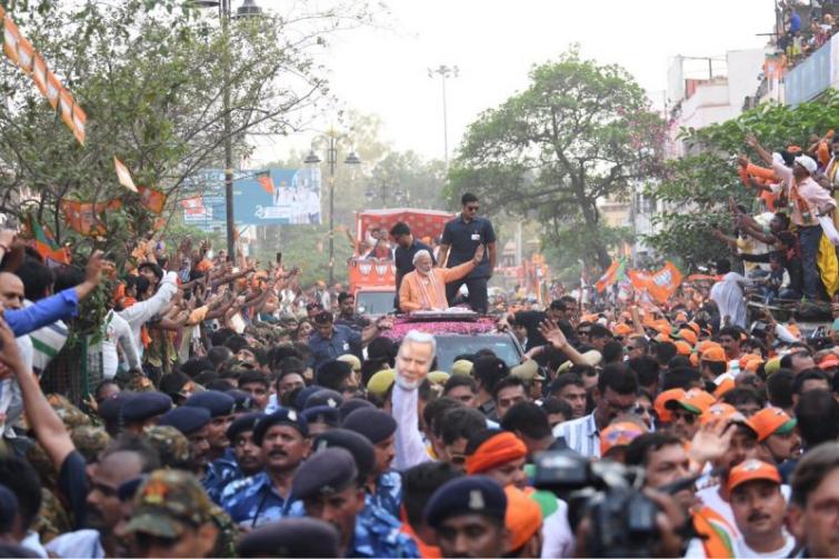 Modi holds roadshow in Varanasi, attends aarti before filing nomination