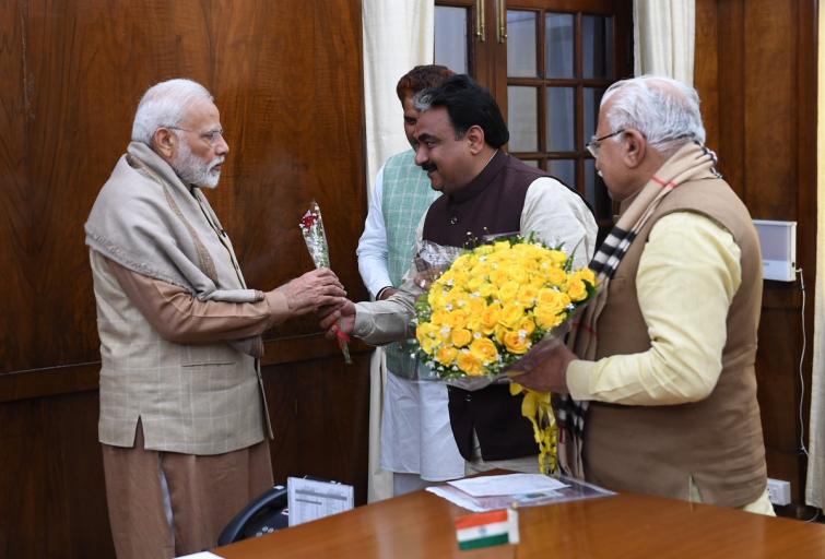 Krishan Lal Middha meets Narendra Modi after Jind by-poll victory