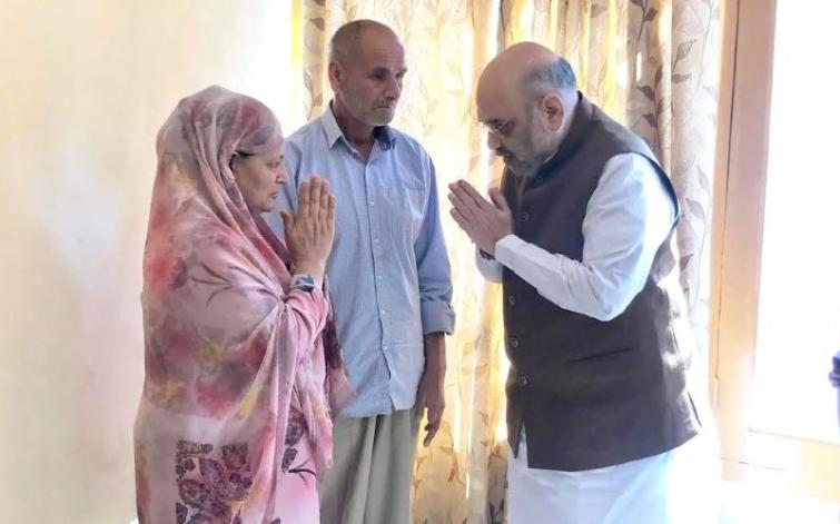 Amit Shah visits martyr SHO's residence in Srinagar, offers condolences