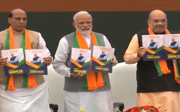 BJP releases Lok Sabha poll manifesto, tries to reach out to farmers, traders; addresses Ram Mandir issue