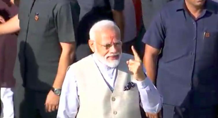 Lok Sabha Polls: PM Narendra Modi casts his vote in Ahmedabad, says voter ID card is powerful than IED
