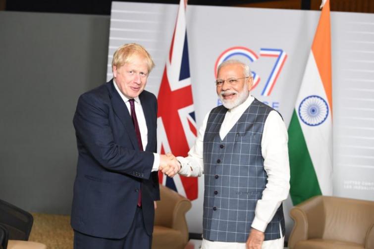 PM Modi congratulates Boris Johnson for winning UK elections