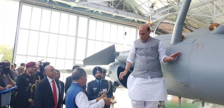 Defence Minister Rajnath Singh receives first Rafale fighter jet in France