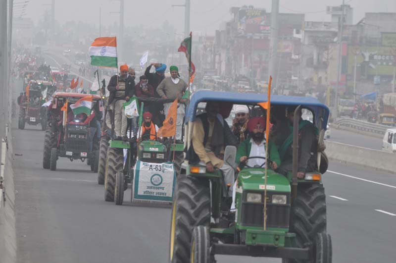 Protesting farmers take out tractor march against farm laws