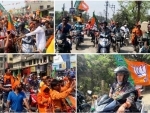 After Mamata Banerjee's show, Smriti Irani rides scooter in Bengal
