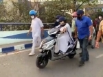 Mamata Banerjee drives e-scooty back home from office protesting fuel price hike