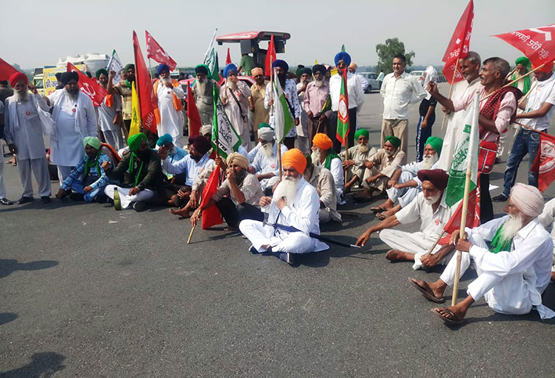 Farmers staging a protest during Bharat Bandh called by Sanyukt Kisan Morcha at Kundali-Manesar-Palwal Expressway on Monday.