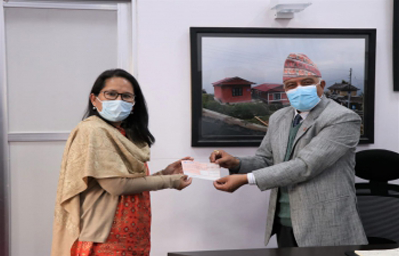 India hands over NR 306 million cheque to CEO NRA towards reconstruction of earthquake affected schools in Nepal