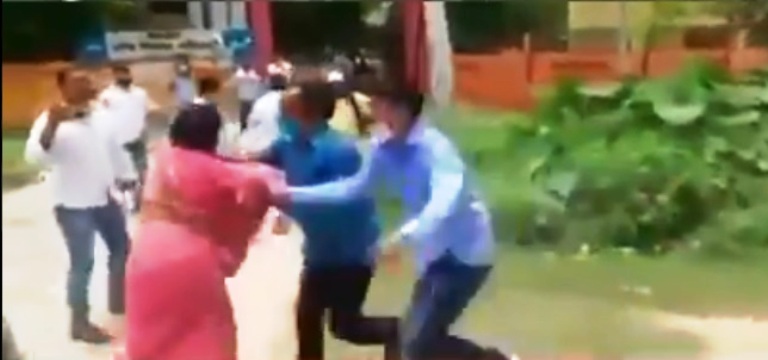 Ahead of UP rural polls video emerges showing a woman's saree being pulled by two men