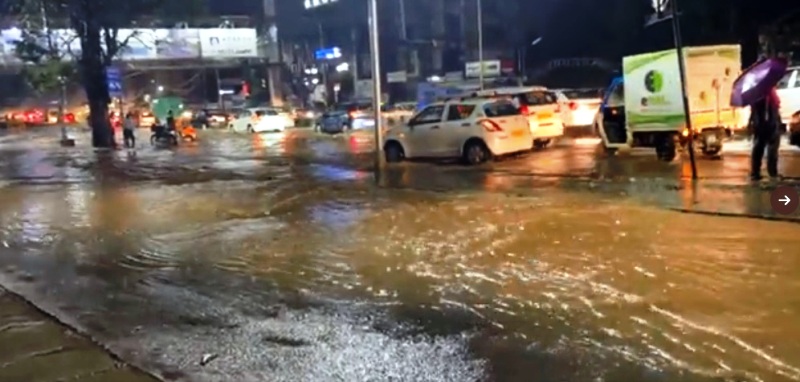 Heavy rains in Bengaluru leave roads waterlogged, cars damaged