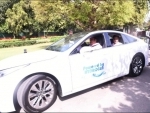 Amid soaring fuel prices, Nitin Gadkari rolls into Parliament in hydrogen-powered car
