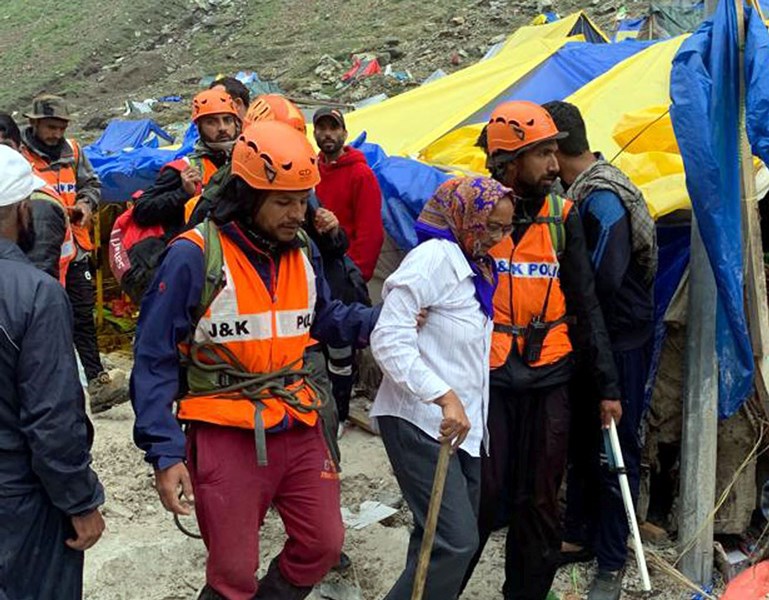 AMARNATH, JUL 9 (UNI):- NDRF personnel carry out the rescue operation at cloudburst affected areas near the Amarnath cave shrine on Saturday. 