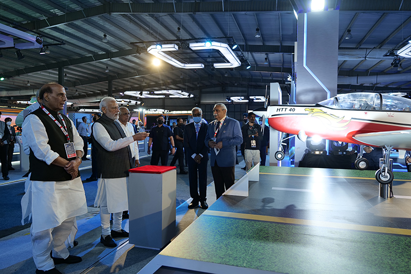 PM Narendra Modi unveils indigenous trainer aircraft HTT-40, designed & developed by HAL, during DefExpo 2022