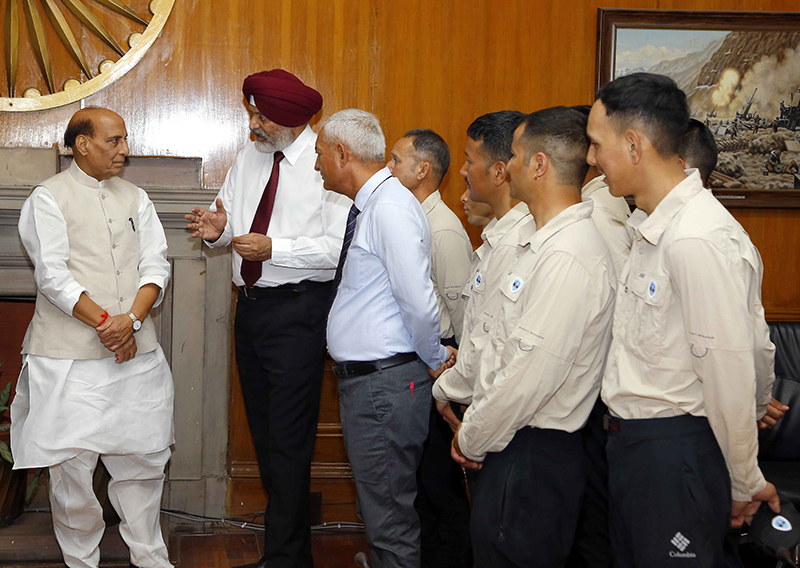 Defence Minister Rajnath Singh interacts with Tiranga Mountain Rescue team in New Delhi