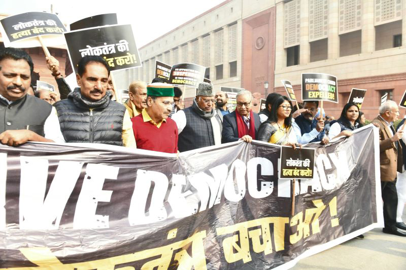 Parliament mass suspension: Opposition MPs hold protest march in Delhi