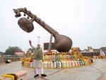 PM Modi stands in front of 40-ft-long Veena at Lata Mangeshkar Chowk in Ayodhya