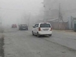 Kashmir shivers as temp drops amidst dense fog