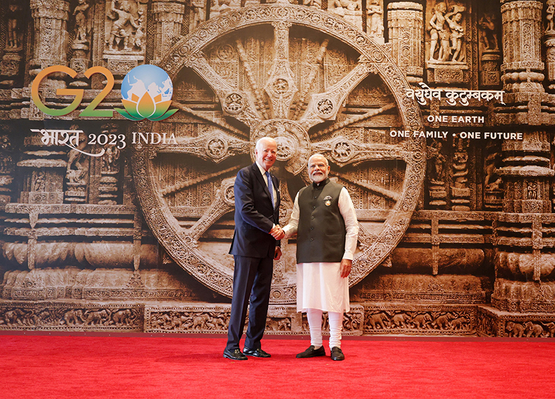 Joe Biden (L) and PM Modi (R)