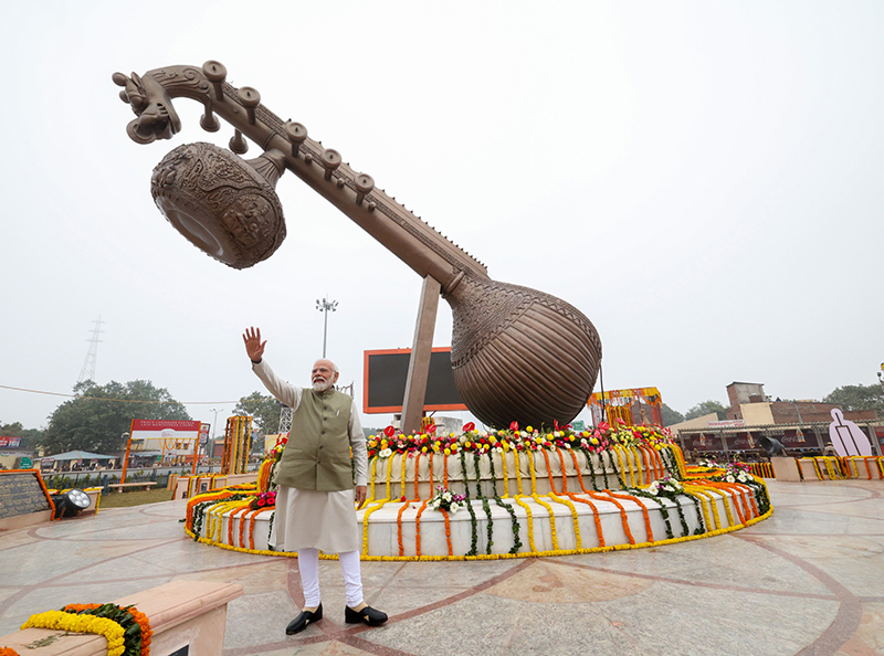 PM Modi stands in front of 40-ft-long Veena at Lata Mangeshkar Chowk in Ayodhya
