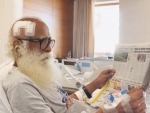 Sadhguru shares health update after brain surgery, new video shows him reading newspaper in hospital