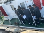Indian Coast Guard members rescue ailing Indonesian national from merchant ship off Diu coast