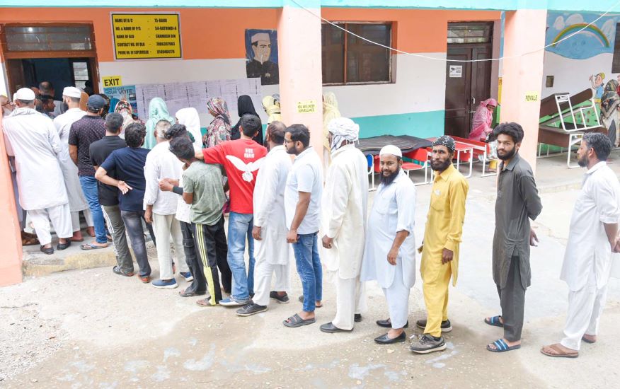 People waiting for their turn to cast their votes in Jammu (Image credit: PIB)