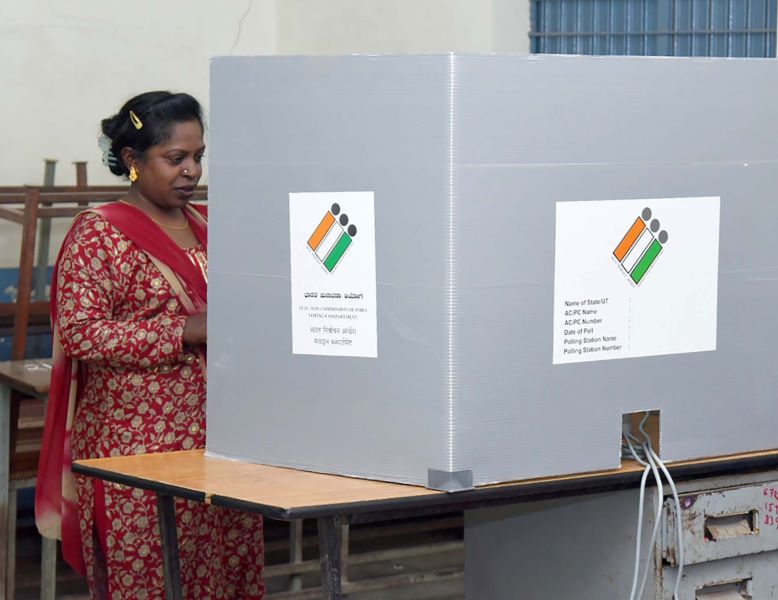 A woman casting vote in Bengaluru, Karnataka (Image credit: PIB)