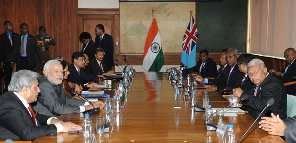 Modi being received on his arrival, at Nausori International Airport