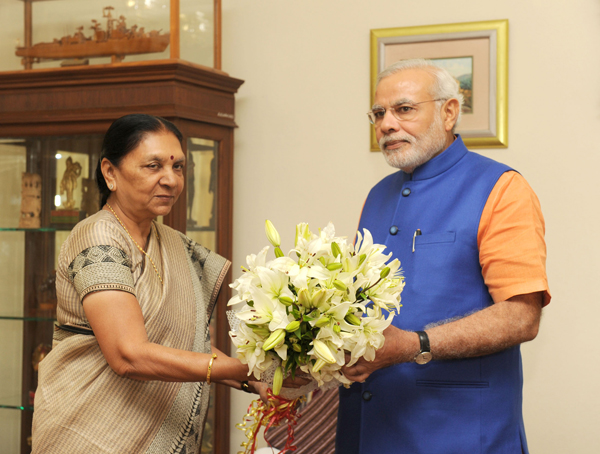 Narendra Modi taking blessing of his mother