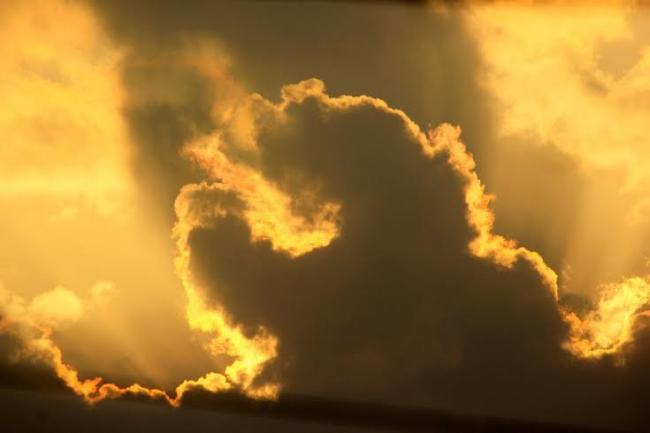 Clouds and raindrops through the 'lens' marking photography day