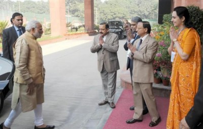  Narendra Modi being received by the Minister of State for Development of North Eastern Region