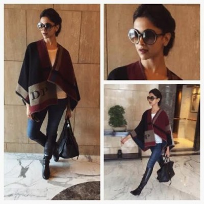 Deepika gets her initails on the Burberry Poncho