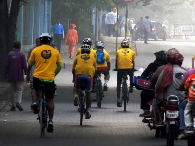 City cyclists pedals miles to ensure healthy smiles