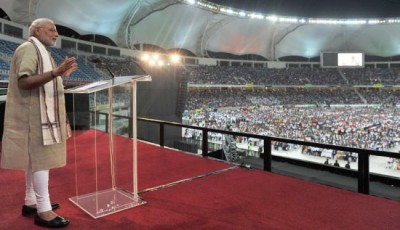 Amid grand reception, PM Modi woos Indian diaspora in packed Dubai stadium