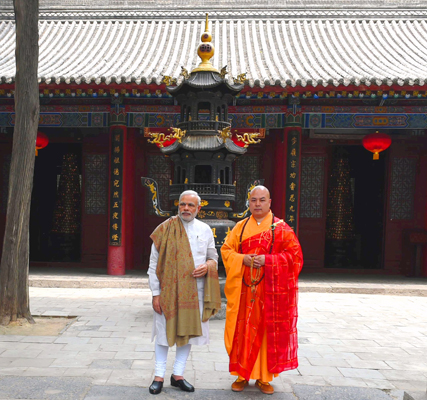  Modi interacting with the people near the Da Xing Shan Temple