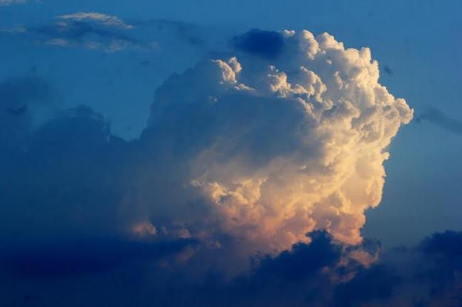 Clouds and raindrops through the 'lens' marking photography day