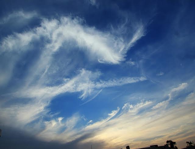 Clouds and raindrops through the 'lens' marking photography day
