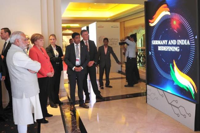 Narendra Modi and the German Chancellor, Dr. Angela Merkel visiting the Robert Bosch Engineering & Innovation Centre, in Bengaluru