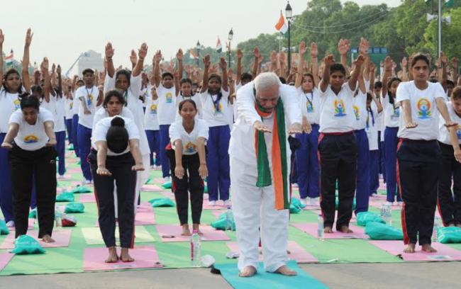 PM Modi leads mass yoga demonstration in Delhi on first International Yoga Day